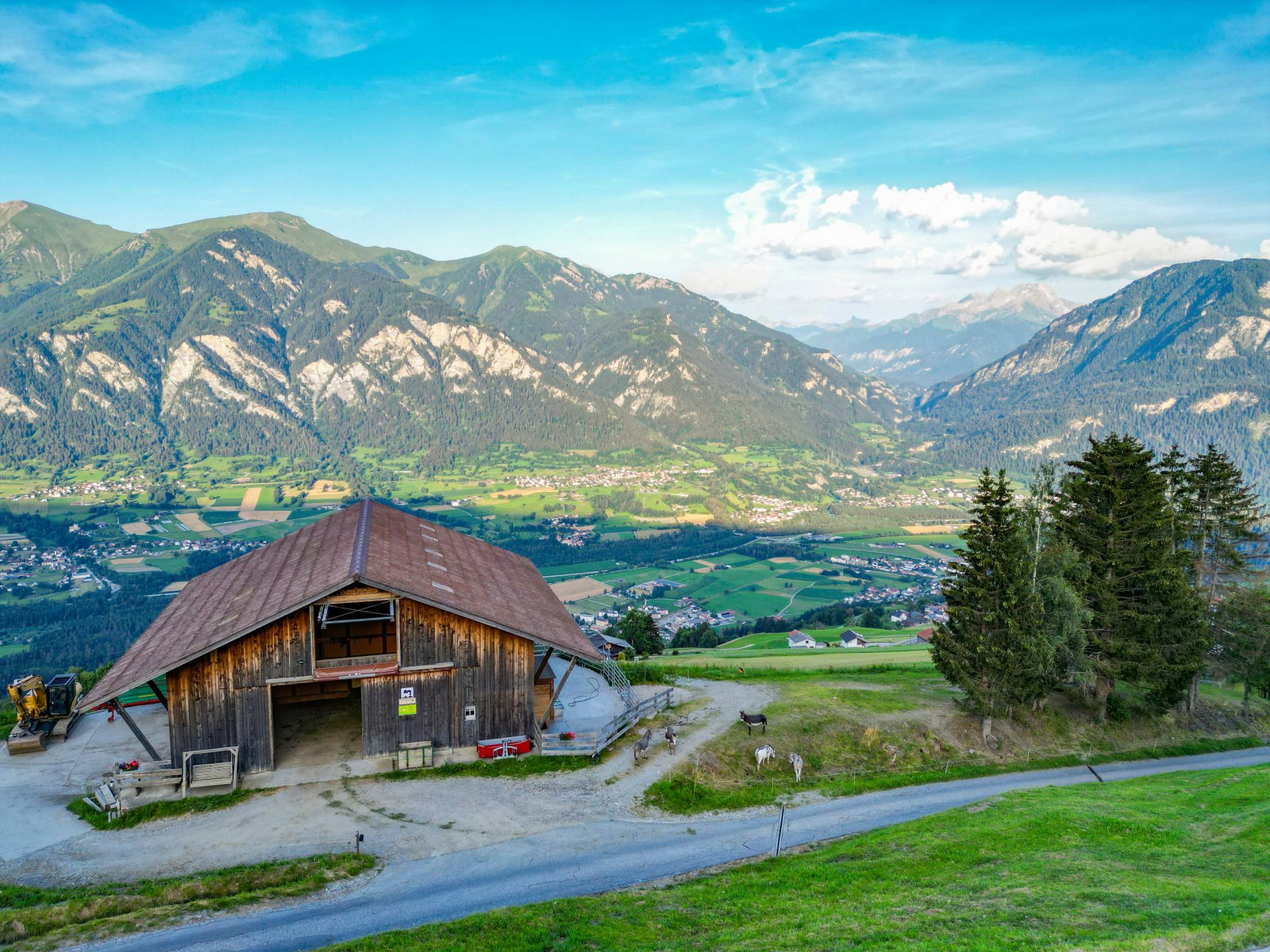 A sloped roof building sitting in a valley