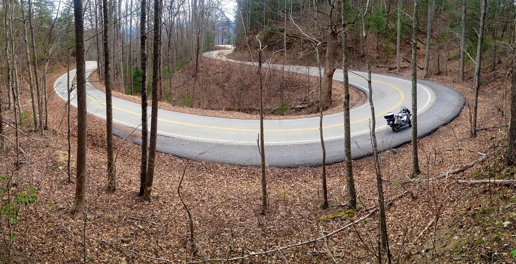A motorcycle parked near the Tail of the Dragon.